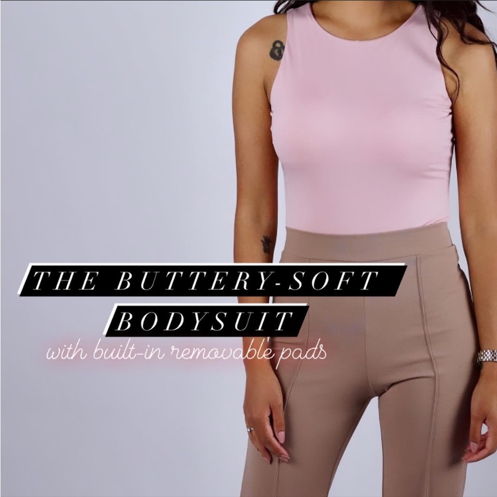 Super soft bodysuit with built in removable pads!